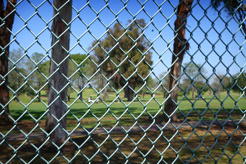 golf course with chainwire fence